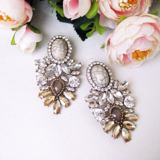 Dvacaman Brand Trendy Big Crystal Statement Earrings Wedding Drop Earrings Women Party Hanging Earrings Jewelry Wholesale